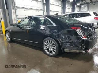 2018 Cadillac CT6 Luxury AWD z VIN 1G6KD5RSXJU102871, wystawiony jako Copart lot #54579165 z przebiegiem 31 219 mil mil oraz Szkody całkowita. Historia ofert i sprzedaży dostępna na DreamBid. Obrazek 2.