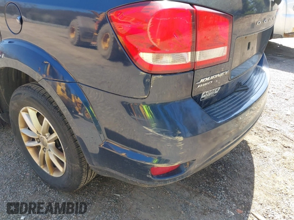 2015 Dodge Journey SXT with VIN 3C4PDDBG1FT701081, listed as a IAAI auction lot 42041392 with 199,683 mi miles and . Bid and sale history available at DreamBid. Image 12.
