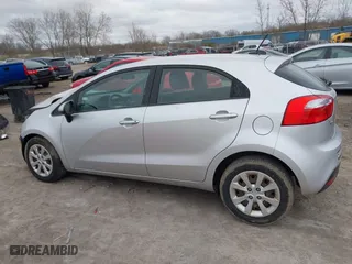 2014 Kia Rio LX with VIN KNADM5A34E6338174, listed as a IAAI auction lot 42039451 with 87,528 mi miles. Bid and sale history available at carsss.com. Image 15.
