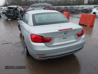 2014 BMW 4 Series 428i with VIN WBA3V5C51EJ968657, listed as a IAAI auction lot 41718019 with 111,083 mi miles and . Bid and sale history available at DreamBid. Image 3.