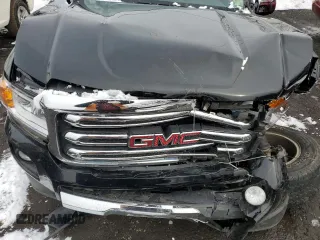 2015 GMC Canyon 4WD SLT with VIN 1GTG6CE35F1236096, listed as a Copart auction lot 44036465 with 55,829 mi miles and Salvage Title. Bid and sale history available at carsss.com. Image 11.