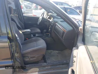 1999 Jeep Grand Cherokee Laredo with VIN 1J4GW58S0XC538913, listed as a IAAI auction lot 42684467 with 241,252 mi miles and . Bid and sale history available at DreamBid. Image 5.