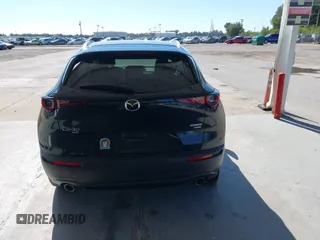 2022 Mazda CX-30 2.5 Turbo with VIN 3MVDMBAY3NM440688, listed as a IAAI auction lot 40860258 with 27,445 mi miles and . Bid and sale history available at DreamBid. Image 16.