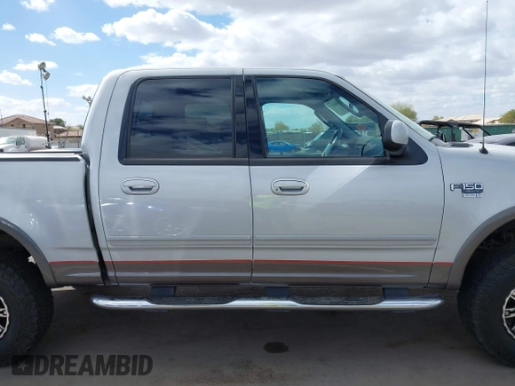 2003 Ford F-150 XLT with VIN 1FTRW08LX3KC79700, listed as a IAAI auction lot 41680562 with 131,052 mi miles. Bid and sale history available at carsss.com. Image 14.