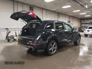 2015 Audi Q7 Premium Plus with VIN WA1LGAFE2FD005746, listed as a IAAI auction lot 42143924 with 143,835 mi miles and . Bid and sale history available at DreamBid. Image 4.