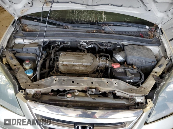 2006 Honda Odyssey LX z VIN 5FNRL38246B056684, wystawiony jako Copart lot #58917745 z przebiegiem 167 067 mil mil oraz Szkoda całkowita • Salvage title. Historia ofert i sprzedaży dostępna na DreamBid. Obrazek 12.