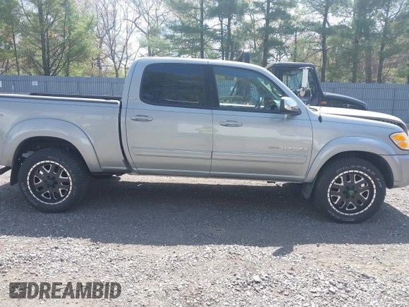 2004 Toyota Tundra SR5 with VIN 5TBDT44174S434897, listed as a IAAI auction lot 42128806 with 218,054 mi miles and . Bid and sale history available at DreamBid. Image 13.