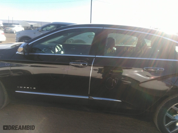2014 Chevrolet Impala LTZ with VIN 1G1145SLXEU148131, listed as a IAAI auction lot 41234896 with 124,304 mi miles. Bid and sale history available at carsss.com. Image 13.