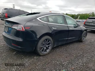 2019 Tesla Model 3 Mid Range z VIN 5YJ3E1EA0KF394514, wystawiony jako Copart lot #58051215 z przebiegiem Nie podano mil oraz Szkody całkowita. Historia ofert i sprzedaży dostępna na DreamBid. Obrazek 3.