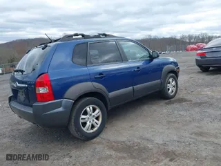 2006 Hyundai Tucson GLS with VIN KM8JN72D06U325677, listed as a IAAI auction lot 42065674 with 168,044 mi miles. Bid and sale history available at carsss.com. Image 4.