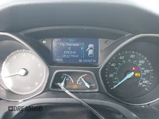 2013 Ford Focus SE with VIN 1FADP3F22DL117712, listed as a IAAI auction lot 42131439 with 124,327 mi miles. Bid and sale history available at carsss.com. Image 7.