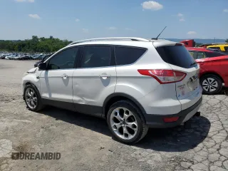 2016 Ford Escape Titanium with VIN 1FMCU9J96GUA48071, listed as a Copart auction lot 60742815 with 193,100 mi miles and Salvage title. Bid and sale history available at DreamBid. Image 2.