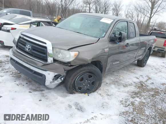 2010 Toyota Tundra 4WD Truck with VIN 5TFCY5F13AX009786, listed as a IAAI auction lot 41354641 with 204,918 mi miles. Bid and sale history available at carsss.com. Image 2.