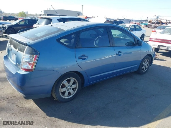 2005 Toyota Prius with VIN JTDKB20U153012990, listed as a IAAI auction lot 42003834 with 158,307 mi miles. Bid and sale history available at carsss.com. Image 4.