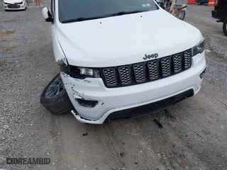 2018 Jeep Grand Cherokee Laredo E with VIN 1C4RJFAG6JC152867, listed as a IAAI auction lot 41486884 with 67,115 mi miles. Bid and sale history available at carsss.com. Image 18.