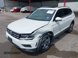 2020 Volkswagen Tiguan SE z VIN 3VV3B7AX4LM032609, wystawiony jako IAAI lot #42074359 z przebiegiem 52 404 mil mil oraz . Historia ofert i sprzedaży dostępna na DreamBid. Obrazek 19.