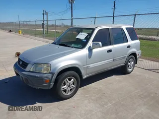 1999 Honda CR-V EX with VIN JHLRD1867XC060816, listed as a IAAI auction lot 41823958 with 220,322 mi miles. Bid and sale history available at carsss.com. Image 2.