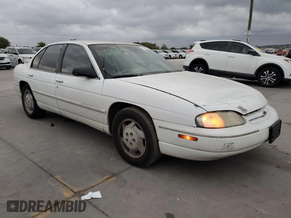 1997 Chevrolet Lumina LS with VIN 2G1WL52M5V9107095, listed as a Copart auction lot 73659954 with 135,669 mi miles and Salvage Title. Bid and sale history available at DreamBid. Image 4.