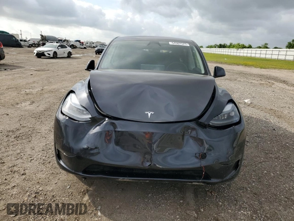 2024 Tesla Model Y с VIN 7SAYGDED4RA329638, выставлен на аукционе Copart как лот 54562525 с пробегом 8 606 миль миль и Списание • Salvage title. История ставок и продаж доступна на DreamBid. Изображение 5.