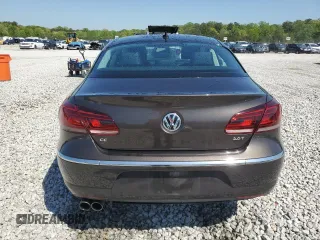 2013 Volkswagen CC Sport Plus z VIN WVWBP7AN7DE515951, wystawiony jako Copart lot #52251575 z przebiegiem 121 414 mil mil oraz Szkody całkowita. Historia ofert i sprzedaży dostępna na DreamBid. Obrazek 6.