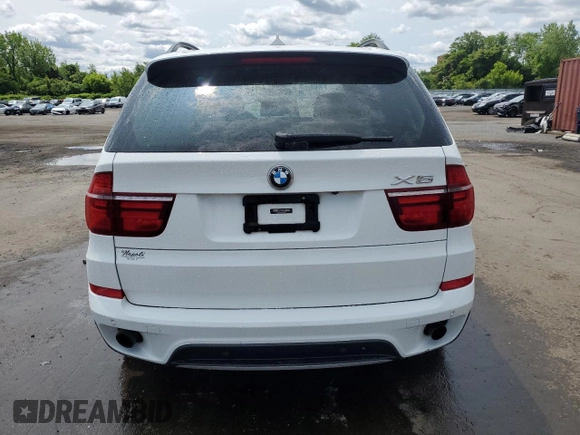 2012 BMW X5 35i with VIN 5UXZV4C54CL763857, listed as a Copart auction lot 57943195 with 143,522 mi miles and Salvage title. Bid and sale history available at DreamBid. Image 6.