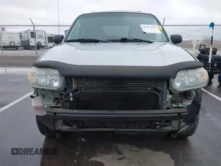 2006 Ford Escape XLT with VIN 1FMYU03126KC55897, listed as a IAAI auction lot 41733243 with 136,989 mi miles. Bid and sale history available at carsss.com. Image 6.