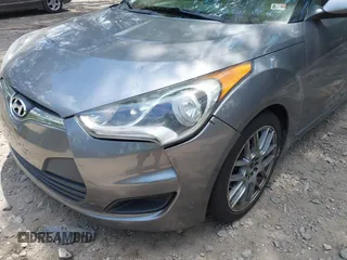 2012 Hyundai Veloster w/Black Int with VIN KMHTC6AD3CU078547, listed as a IAAI auction lot 42633915 with 143,633 mi miles and . Bid and sale history available at DreamBid. Image 6.
