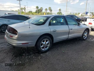 1997 Oldsmobile Aurora with VIN 1G3GR62C0V4102252, listed as a Copart auction lot 53270245 with 123,615 mi miles and Salvage Title. Bid and sale history available at DreamBid. Image 3.