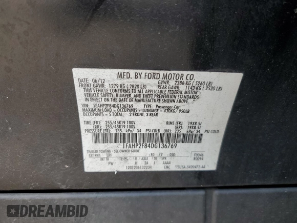 2013 Ford Taurus Limited with VIN 1FAHP2F84DG136769, listed as a Copart auction lot 60990765 with 228,994 mi miles and Salvage title. Bid and sale history available at DreamBid. Image 12.