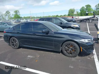 2021 BMW 5 Series 540i with VIN WBA53BJ08MWW95688, listed as a IAAI auction lot 42064036 with 39,410 mi miles and . Bid and sale history available at carsss.com. Image 13.