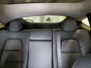 2024 Tesla Model Y Long Range с VIN 7SAYGDEE8RA270862, выставлен на аукционе Copart как лот 58099875 с пробегом 24 856 миль миль и На запчасти • Non repairable. История ставок и продаж доступна на DreamBid. Изображение 10.