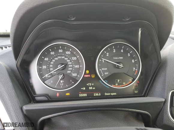 2015 BMW 2 Series 228i with VIN WBA1K5C57FV242909, listed as a Copart auction lot 77490994 with 55,099 mi miles and Salvage Title. Bid and sale history available at carsss.com. Image 9.