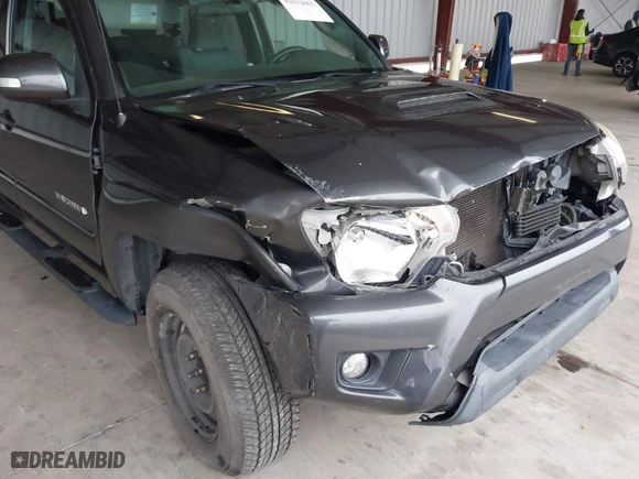 2015 Toyota Tacoma with VIN 3TMLU4EN6FM198795, listed as a IAAI auction lot 41612057 with NaN miles. Bid and sale history available at carsss.com. Image 6.
