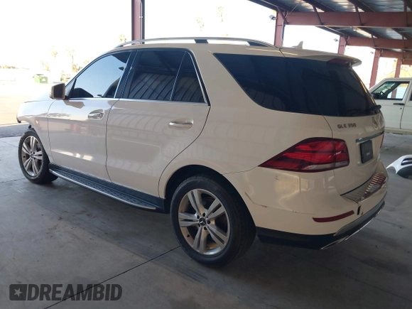 2016 Mercedes-Benz GLE 350 with VIN 4JGDA5JBXGA710342, listed as a IAAI auction lot 41012189 with 128,325 mi miles and . Bid and sale history available at DreamBid. Image 3.