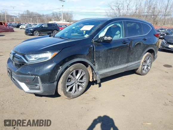 2020 Honda CR-V Touring with VIN 2HKRW2H98LH626651, listed as a IAAI auction lot 41668951 with 64,391 mi miles and . Bid and sale history available at DreamBid. Image 2.