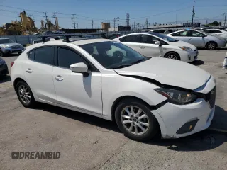 2015 Mazda 3 i Touring with VIN 3MZBM1L74FM178525, listed as a Copart auction lot 57079635 with 88,730 mi miles and Salvage title. Bid and sale history available at DreamBid. Image 4.