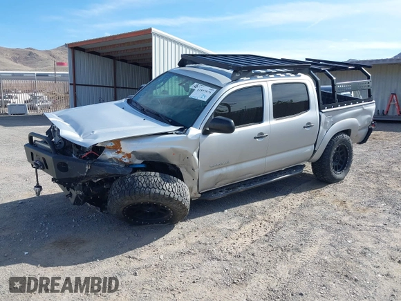 2013 Toyota Tacoma with VIN 5TFLU4EN2DX049615, listed as a IAAI auction lot 41893876 with 160,752 mi miles and . Bid and sale history available at DreamBid. Image 2.