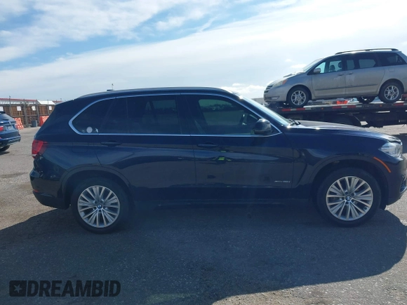 2016 BMW X5 xDrive35i z VIN 5UXKR0C54G0P19251, wystawiony jako IAAI lot #41724798 z przebiegiem 87 824 mil mil oraz . Historia ofert i sprzedaży dostępna na DreamBid. Obrazek 13.
