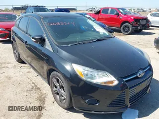 2014 Ford Focus SE with VIN 1FADP3K29EL273107, listed as a IAAI auction lot 42083524 with 140,834 mi miles. Bid and sale history available at carsss.com. Image 6.