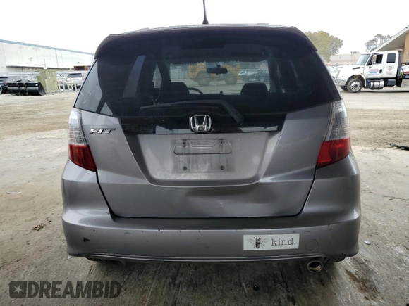 2009 Honda Fit Sport z VIN JHMGE884X9C002533, wystawiony jako Copart lot #62222155 z przebiegiem 133 148 mil mil oraz Czysty tytuł • Clean title. Historia ofert i sprzedaży dostępna na DreamBid. Obrazek 6.