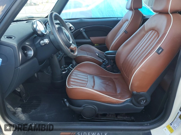 2008 MINI Convertible with VIN WMWRF33518TF67472, listed as a Copart auction lot 72073604 with 61,024 mi miles and Salvage title. Bid and sale history available at DreamBid. Image 7.