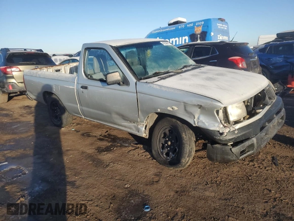 1999 Nissan Frontier XE with VIN 1N6DD21S4XC341893, listed as a Copart auction lot 42508815 with 86,040 mi miles and Salvage title. Bid and sale history available at DreamBid. Image 4.