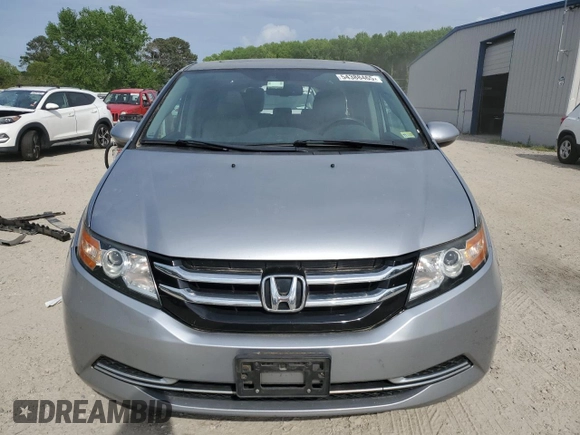 2016 Honda Odyssey EX-L with VIN 5FNRL5H63GB118303, listed as a Copart auction lot 54388465 with 94,789 mi miles and Salvage Title. Bid and sale history available at DreamBid. Image 5.
