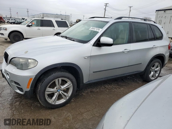 2011 BMW X5 35i with VIN 5UXZV4C5XBL405046, listed as a Copart auction lot 84447124 with 180,936 mi miles and Clean Title. Bid and sale history available at carsss.com. Image 1.