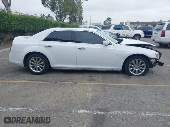 2012 Chrysler 300 C z VIN 2C3CCAET4CH236569, wystawiony jako IAAI lot #42181321 z przebiegiem 144 243 mil mil oraz . Historia ofert i sprzedaży dostępna na DreamBid. Obrazek 13.