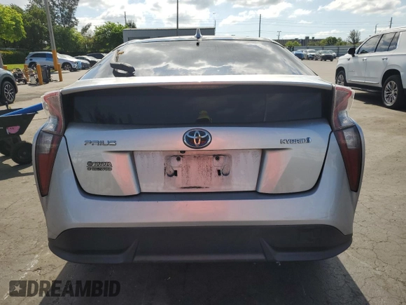 2017 Toyota Prius Two z VIN JTDKARFU0H3036043, wystawiony jako Copart lot #57936795 z przebiegiem 142 025 mil mil oraz Szkoda całkowita • Salvage title. Historia ofert i sprzedaży dostępna na DreamBid. Obrazek 6.