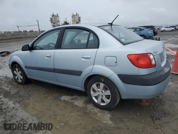 2009 Kia Rio LX with VIN KNADE223396443465, listed as a Copart auction lot 51370975 with 110,952 mi miles and Salvage Title. Bid and sale history available at carsss.com. Image 2.