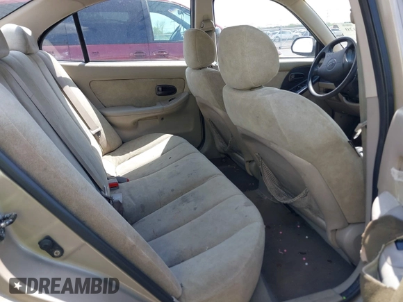 2003 Hyundai Elantra GLS z VIN KMHDN45D83U514659, wystawiony jako IAAI lot #42016920 z przebiegiem 125 673 mil mil oraz . Historia ofert i sprzedaży dostępna na DreamBid. Obrazek 8.