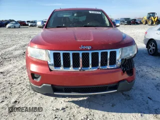 2011 Jeep Grand Cherokee Overland with VIN 1J4RS6GG7BC665979, listed as a Copart auction lot 83394214 with 216,988 mi miles and Salvage Title. Bid and sale history available at DreamBid. Image 5.