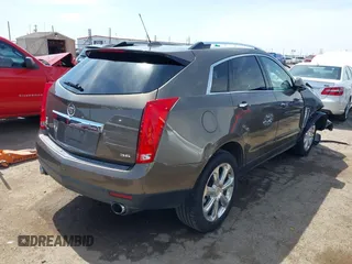 2016 Cadillac SRX Performance Collection z VIN 3GYFNCE39GS512286, wystawiony jako IAAI lot #42392467 z przebiegiem 95 708 mil mil oraz . Historia ofert i sprzedaży dostępna na DreamBid. Obrazek 4.